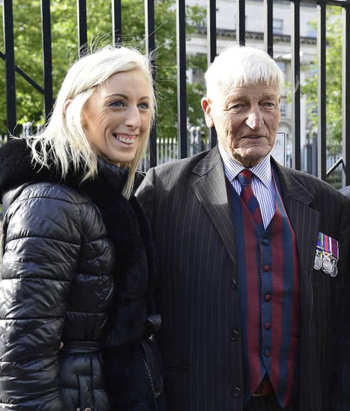 This is ⁦<a href="/carlalockhart/">Carla Lockhart MP</a>⁩ who wrote to Birmingham FC to get their Irish girls sacked. This soldier &amp; a colleague shot a learning disabled catholic in the back killing him.They said they thought he had a gun.Carla made a point of hugging him &amp; posing for pics outside court.