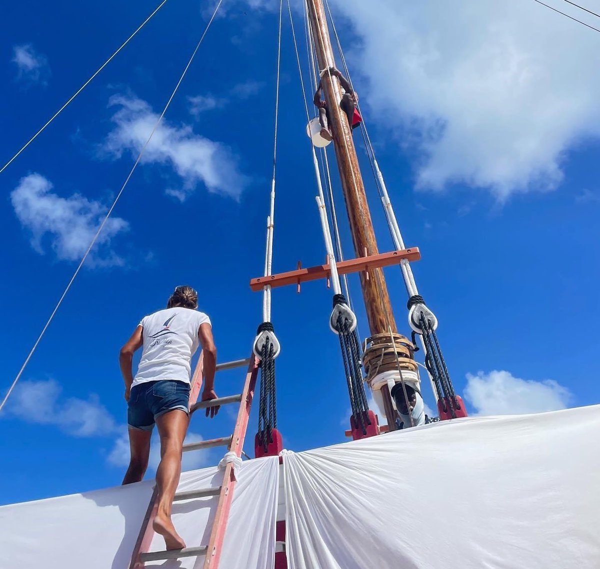 sailtradition's tweet photo. In September and October we get to and from work on a ladder and hope that the sky stays just like this and rain-free at least until it's dark. 🤞
#TraditionSailingAnguilla
#slooplife #sailboat
#maintenance
#Carriacou https://t.co/d1sCjCOjef