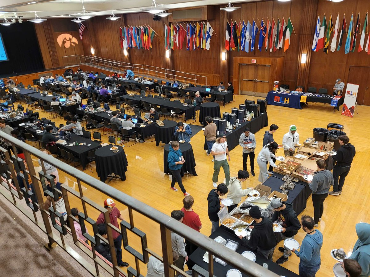 MLHacks's tweet photo. Hacking has now ended at #HackUIowa! Here's a great view of our hackers hard at work, and grabbing some well-deserved pizza! 🍕 https://t.co/ZZtFGOvN6d