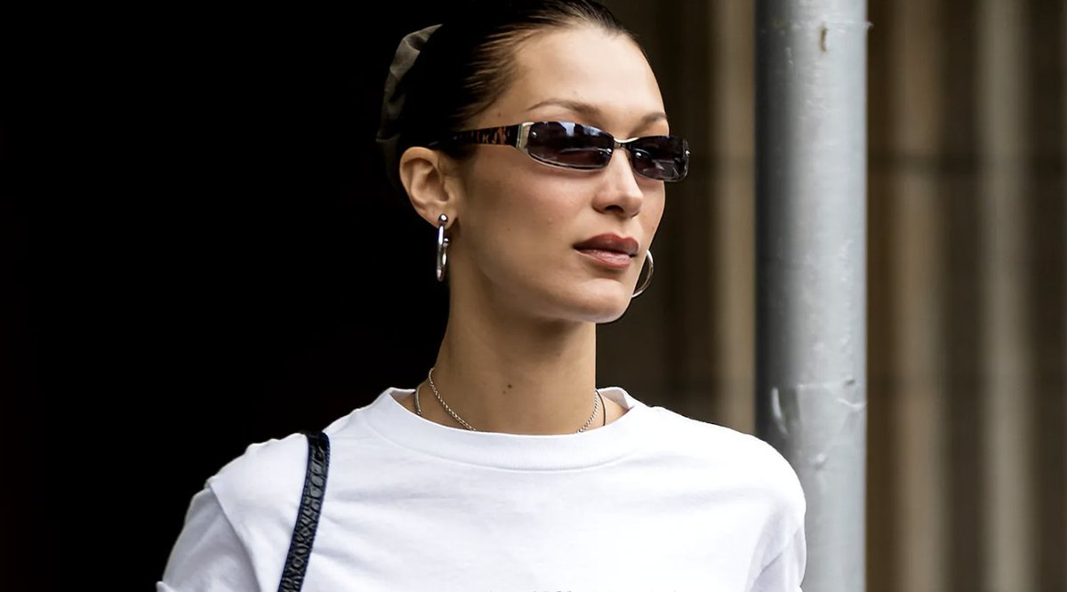 Bella Hadid Combined a Mullet-Pixie Haircut with Asymmetric Baby Bangs bit.ly/3VvZ5rY via <a href="/Allure_magazine/">Allure</a> #hairstyle