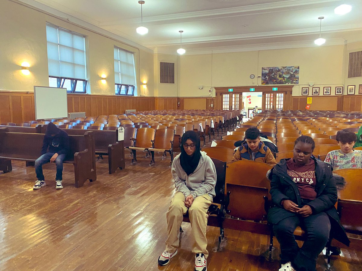 JNolin6's tweet photo. Took these awesome Gr. 8s @QVPSVikings to their beautiful auditorium for our practice this week. Checking in with ourselves; emotions/bodies/thoughts. Using sounds near & far as an anchor for attention. No effort. Awareness. @gecdsbpro #supportingwellbeing #learningnonreactivity https://t.co/S47gked2TI