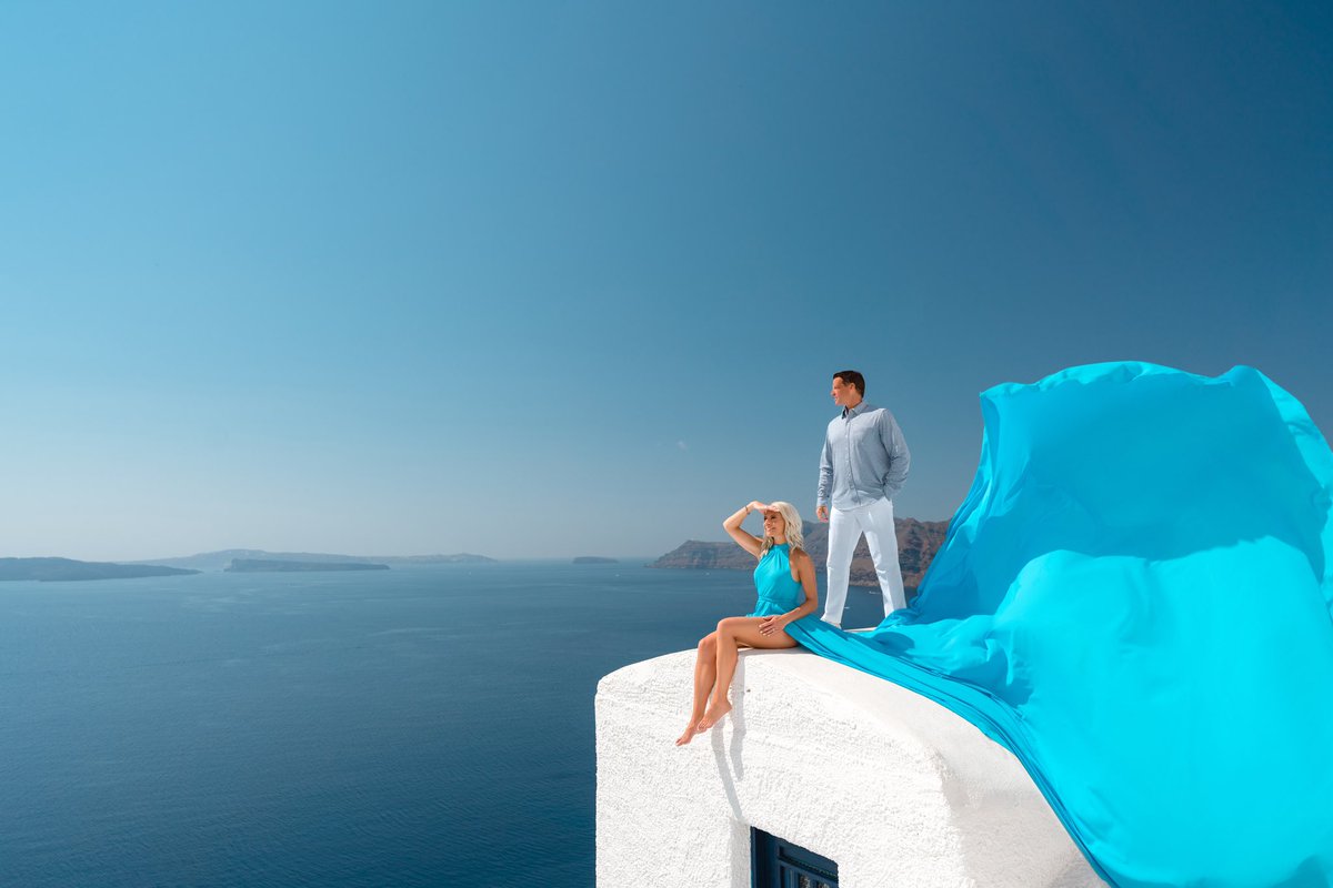 TyfaniKennedy's tweet photo. The best love stories never end.  We celebrated our 10th wedding anniversary with a photoshoot in Santorini and the photos are everything we dreamed they would be! #santorinidress #santorini #santorinigreece #santoriniflyingdress #tyfanitravels #timandtyfani #10yearanniversary https://t.co/sFPlNAx0hI