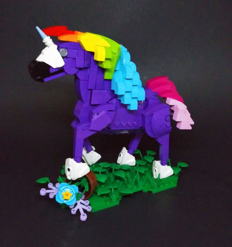 blocksmagazine's tweet photo. Petunia the Purple Unicorn by Daniel Olvera brings all the colour to LEGO! #weloveMOCs https://t.co/Jn8ly6bJCR