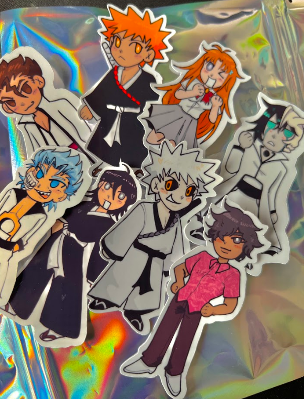 bineshiikwe's tweet photo. HI ALL I OFFICIALLY HAVE A SHOP!!!! I have some of my con leftovers up right now, including prints, bleach stickers, and a pochita charm! RTs are appreciated and if theres any questions/checkout issues feel free to dm me! <333 https://t.co/NXTFK0A1hZ https://t.co/QHivjYqIwW