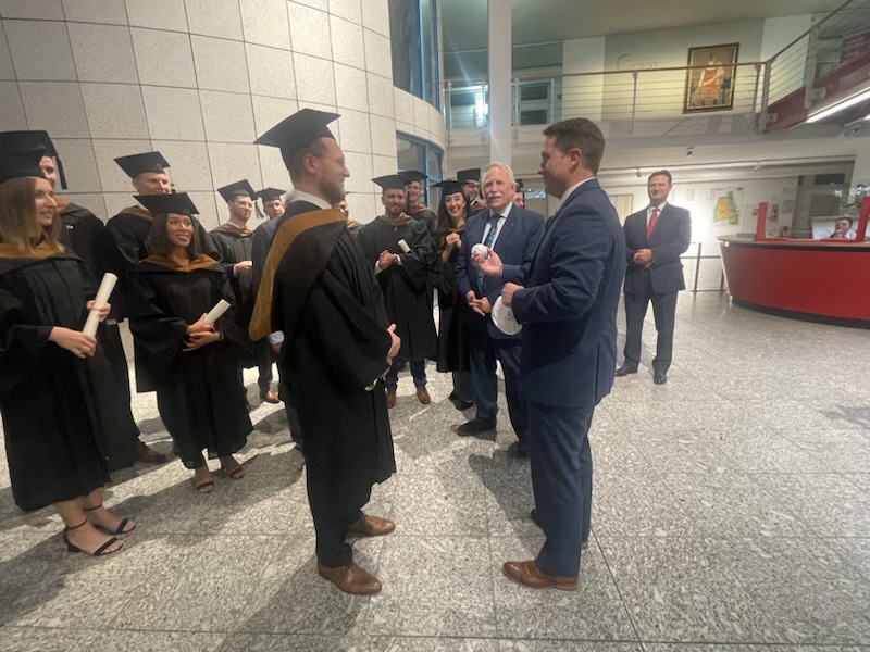 ForForcht's tweet image. Dr. Garrett celebrated with our Global MBA cohort graduating this weekend in Germany. Congrats to our grads!  And, of course, presenting the signed baseball…😄