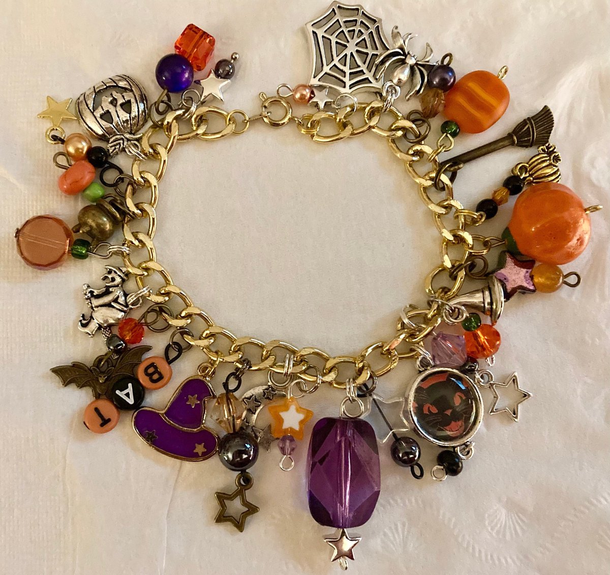 FanGirlStuff's tweet photo. Also added a gold color design to my #etsy shop: One-of-a-Kind Witch themed Halloween Charm Bracelet https://t.co/1vWcq0pdOi #halloween #holiday #charmbracelet #scary #spider #pumpkin #broom #jackolantern https://t.co/oFPJPuIpt3
