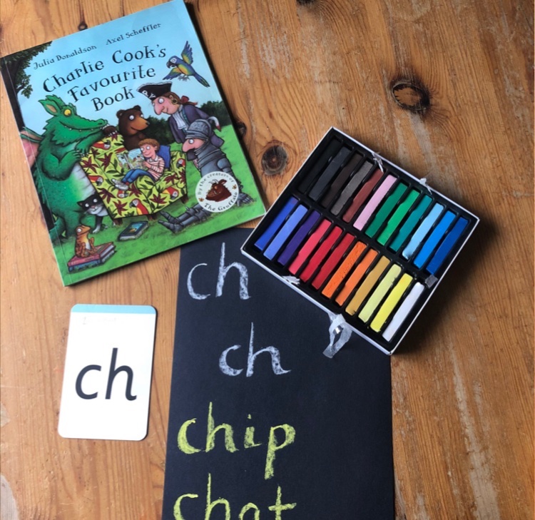 OpyMrs's tweet photo. Linking a story to a new phoneme can really help remind children that the phonemes they are learning are leading the way to learning to read. We are writing with ch ch ch chalk #phonics #literacy #CharlieCooks #JuliaDonaldson #RWI https://t.co/sW5sulakc6