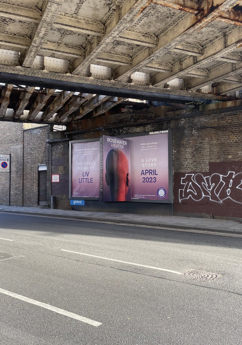 We are delighted to reveal the cover of ROSEWATER by Liv Little with its very own giant-sized billboard in Loughborough Junction 🥳 come down over the next two weeks to see it in person! 

Coming April 2023
Available to pre-order now 💜