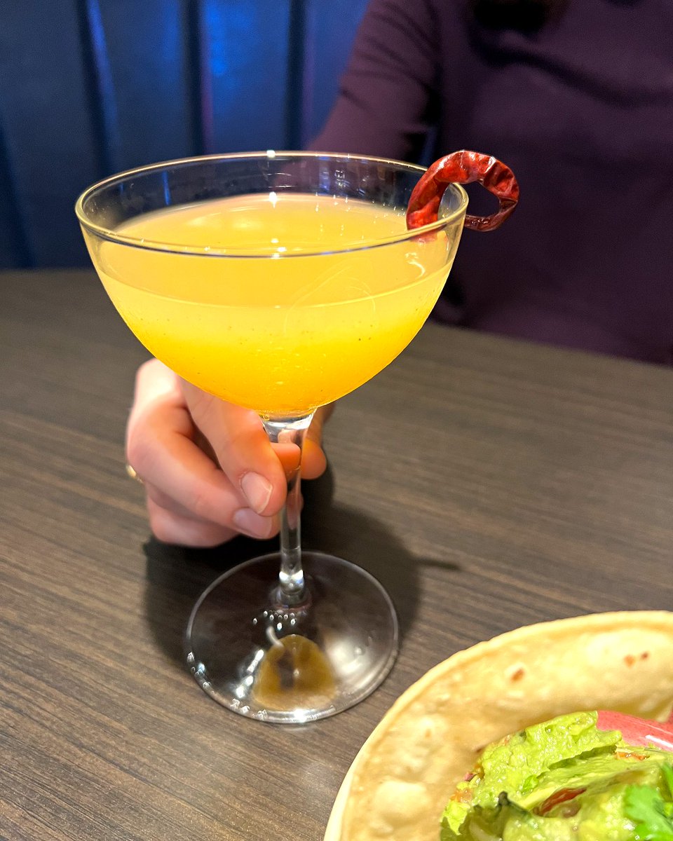 Sometimes we keep it simple. Enjoy fresh guacamole with our touch of serrano pepper and a refreshing cocktail to wash it all down.