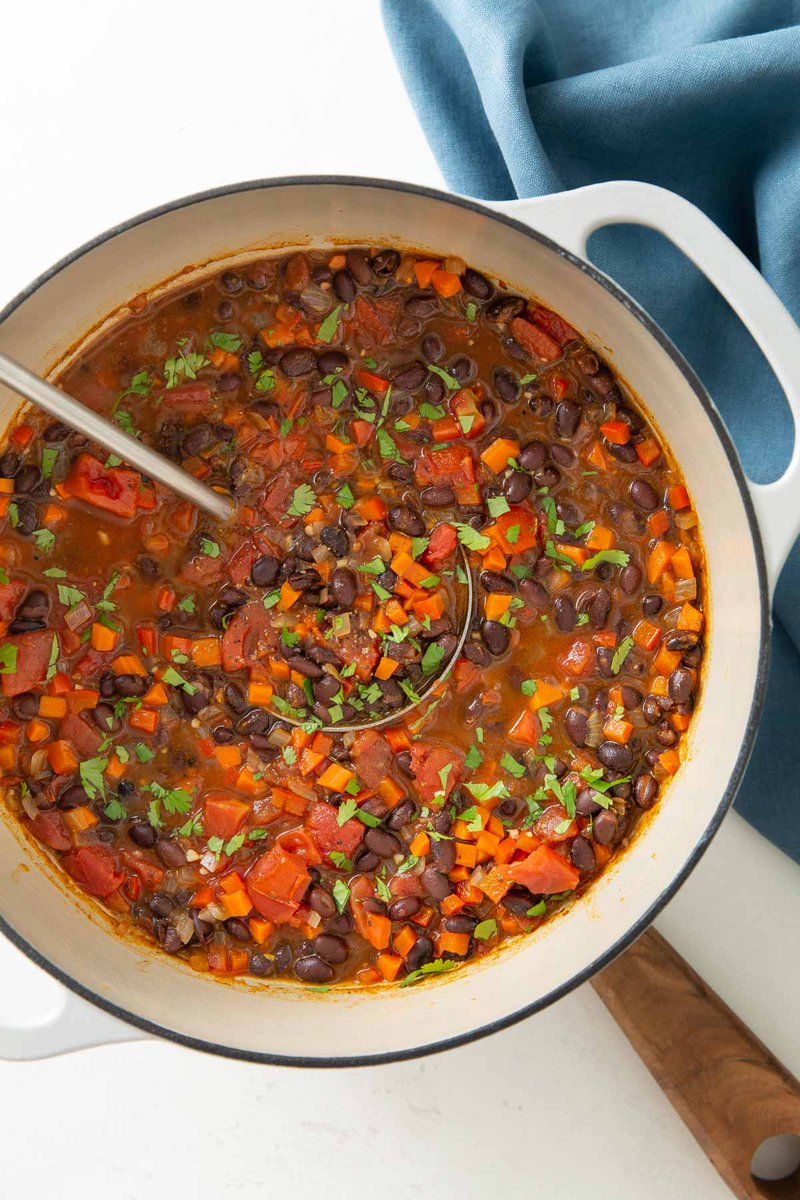 This flavor-packed Black Bean Soup is an easy weeknight dinner using canned black beans and simple ingredients... it's budget friendly, too!  bit.ly/3yN3cGn