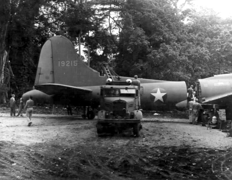 southpacificww2's tweet photo. Ground crews from Air Corps Supply, 29th Air Service Group are assembling a new tail on a Boeing B-17 Flying Fortress somewhere in the Pacific in late 1943. US Archives pic. https://t.co/Gx9fJvp1LP
