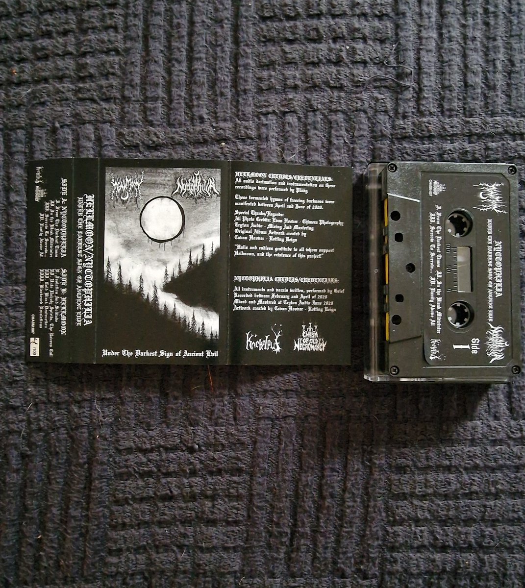 LordOfTheShado8's tweet photo. Finally through the Monday Mail these gems. Honestly these topped my day. Here we have #Hellmoon & #Nyctophilia Under the Darkest Sign of evil Split. Limited Edition Cassette number 4/100 and signed by Plรครคg as well. Hail to the #blackflame #Foras #LordOfTheShadows ๐ฏโ๏ธโ๏ธ๐ค๐ฅ https://t.co/BEv5F2uWCm