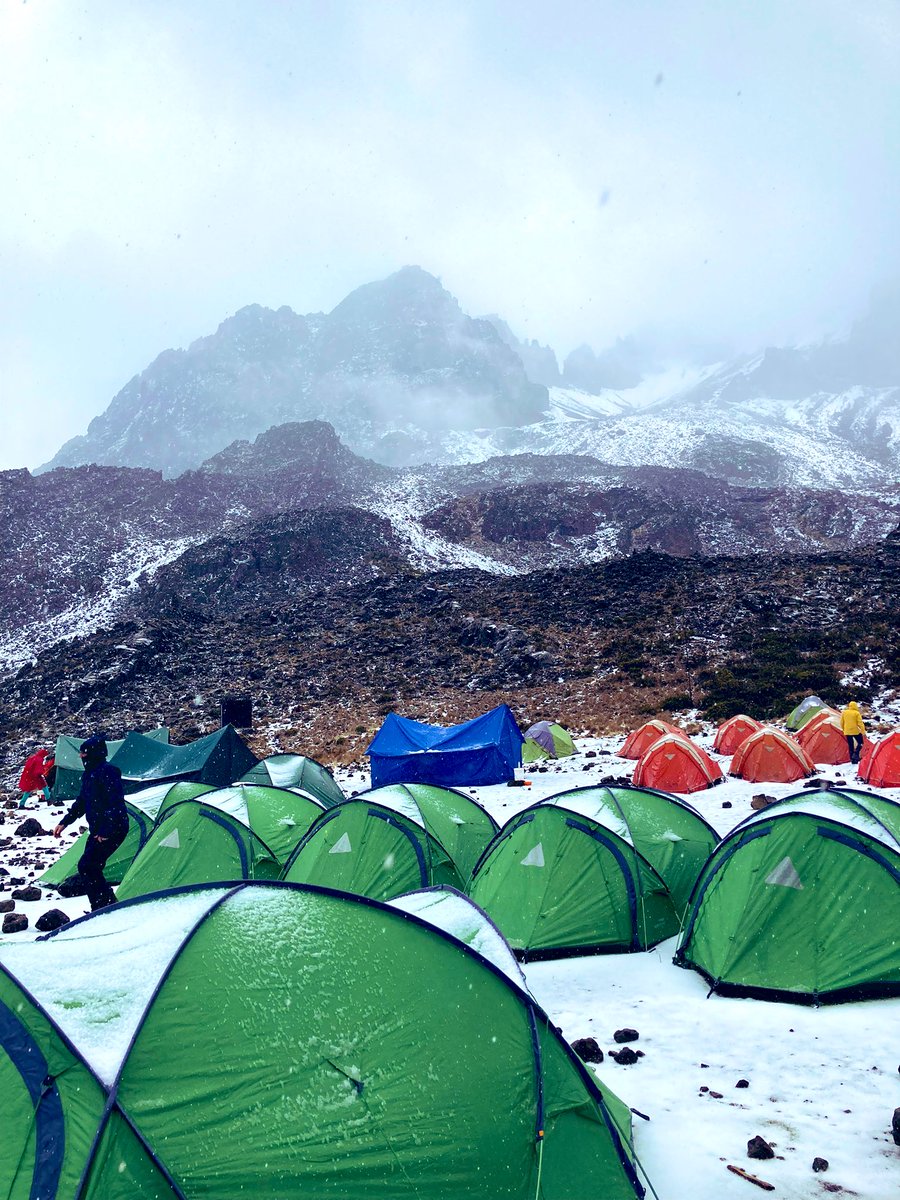 estherswaff's tweet photo. We’ve made it to #Kilimanjaro base camp💪 (&amp; found wifi 🧐) Challenging few days with snow setting in, but the team in high spirits! Leaving at midnight for the summit 🏔
Thank you SO much for your support so far- still time at: https://t.co/OIeSzelSz0
#climbforfreedom @ijmuk https://t.co/mQdn8Z43ph