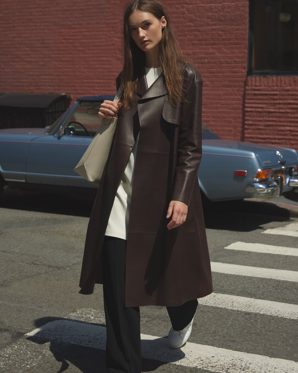 Taking Monday in stride wearing the Wrap Trench Coat in Leather.