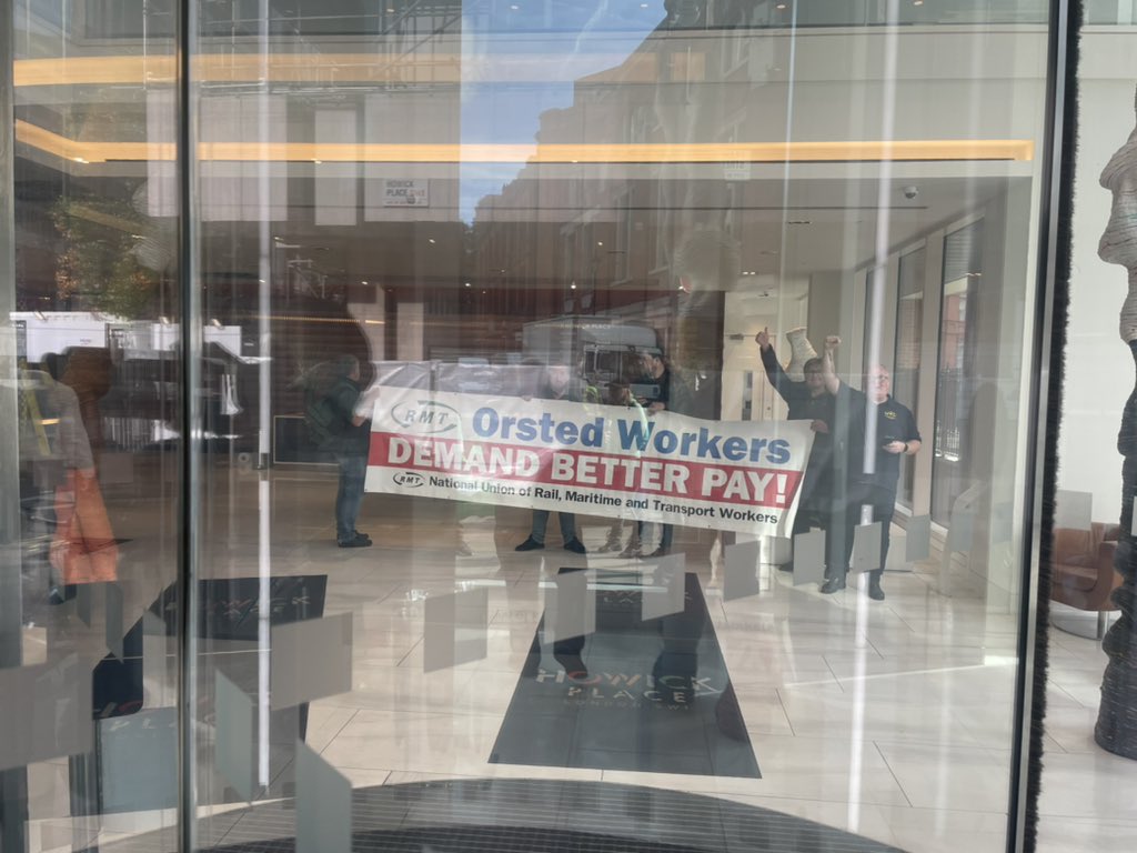 Big_Jim__Larkin's tweet photo. At the HQ of Orsted. A flash @RMT demo is currently taking place inside the building, and outside the building. 
Orsted employ our offshore members and are refusing to meet RMT to have paytalks. They are also victimising workers for raising genuine health and safety concerns. https://t.co/jV5eyYQYyi