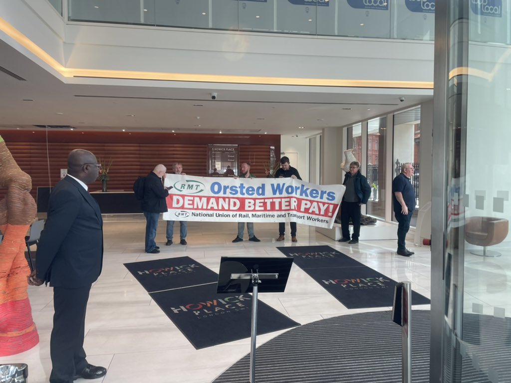 Big_Jim__Larkin's tweet photo. At the HQ of Orsted. A flash @RMT demo is currently taking place inside the building, and outside the building. 
Orsted employ our offshore members and are refusing to meet RMT to have paytalks. They are also victimising workers for raising genuine health and safety concerns. https://t.co/jV5eyYQYyi