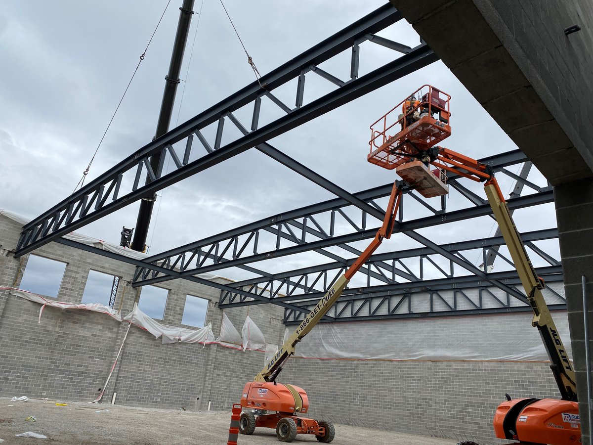 rothbm74's tweet photo. Setting some giant truss's in the gym today. Platte Purchase Middle School. @McCownGordon @HollisandMiller #PCR3Proud https://t.co/zNYYkhisoQ