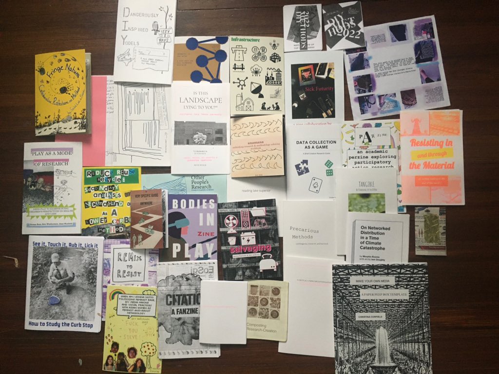 mayalivio's tweet photo. so many zines! finally got my hands on the physical version of the #DIYMETHODS conference @lowcarbonmethod. big yes to tactile research. https://t.co/9urIWA2Fxl