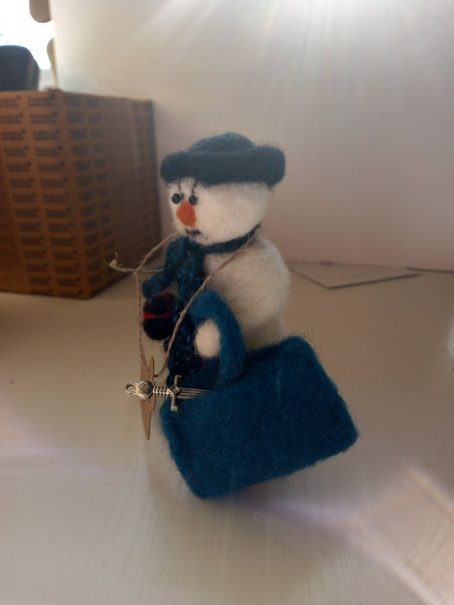 TheCultofMe's tweet photo. We've entered the final few hours for the handmade felt Angry Snowman auction and I'm sure we can raise more than £5 for this charming, yet sinister character.

Bid now to own him for yourself, or as a cool Christmas gift for someone you know:

https://t.co/ilqsQagu9C https://t.co/A157aRtJTb