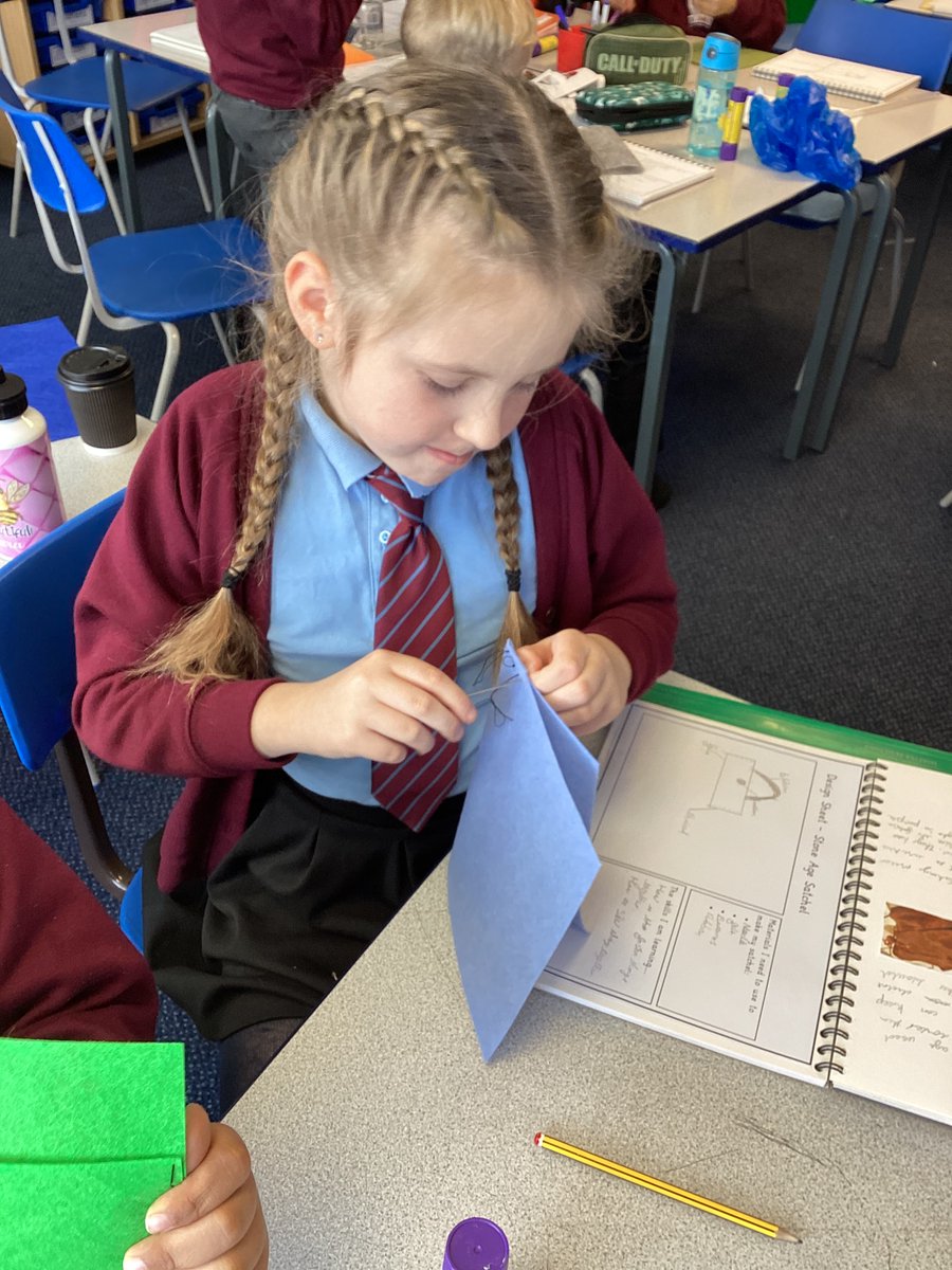 Year3and4C's tweet photo. This morning, Brownlees @Year3and4C have been designing and making their own Stone Age satchels! They learnt how to do a running stitch to bring two sections of fabric together. 🪡 🧵 @church_prim @heppdt #textiles #satchels #stoneage https://t.co/BWWeIjaaV9
