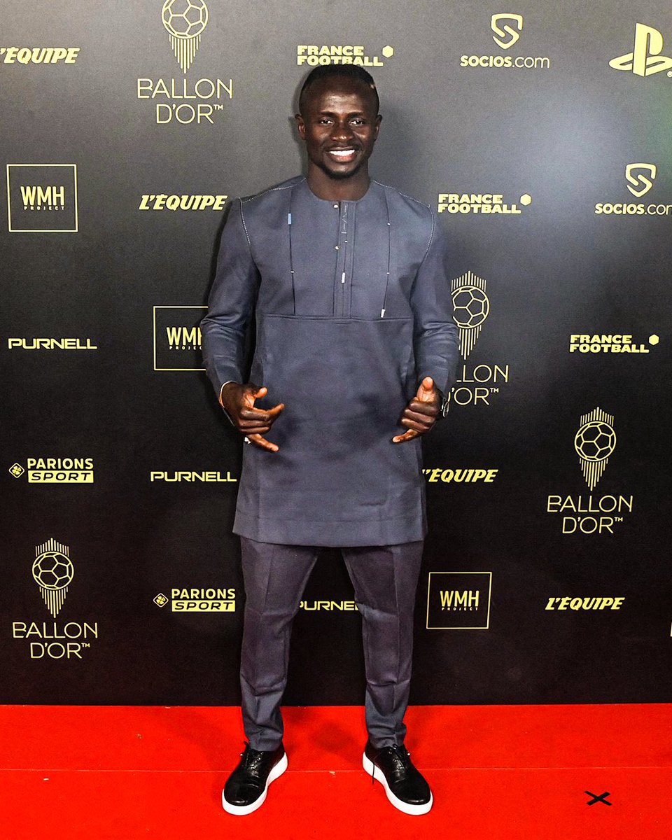 wode_maya's tweet photo. This is how African leaders need to represent Africa anytime they go for a mission out of Africa!Our Culture Our Pride!So proud of you Mane #BallonDor https://t.co/UCdXJDa9lI