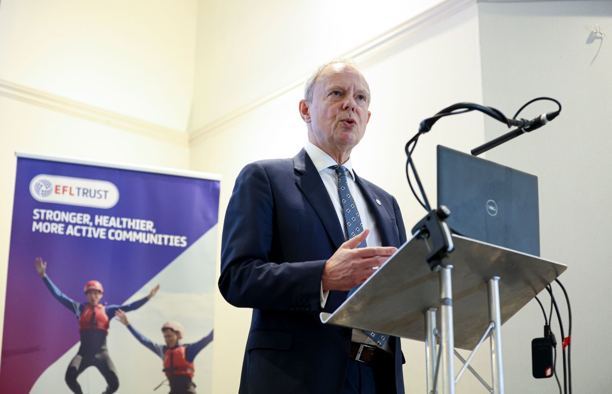 EFL's tweet photo. EFL Chief Executive, Trevor Birch, speaking at the #EFLTrustConference: 

“Football is a force for change. Where there are issues, there are opportunities to make a difference and by improving communities together, we will improve our sport.” 💙

#EFL | 
@EFLTrust https://t.co/Bvp3IXex3I