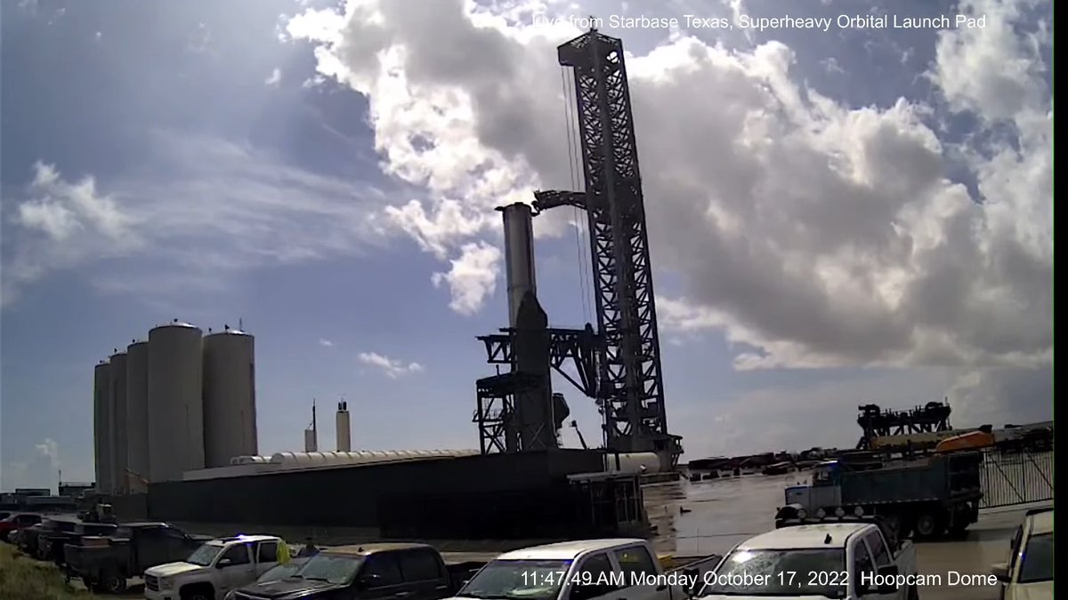 VickiCocks15's tweet photo. What to do when #SpaceX only send in ONE tanker in 30 hours? Move on to counting dirt deliveries to the #LaunchComplex at #Starbase! FYI I've just counted in the 100th delivery in just under 4.5 hours! Thank you for the #D2 gate coverage @davidgojr #HoopCam https://t.co/zJgFw4VMB2