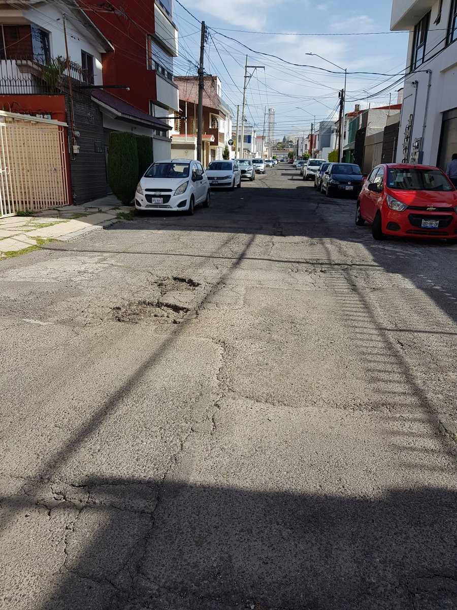ColonosElVergel's tweet photo. .@InfraPue por favor se les solicita de la manera más atenta que puedan tapar a la brevedad los baches que hay en la Colonia El Vergel, específicamente como los del tramo de la Privada 29 C Sur que desemboca al Circuito Juan Pablo II. Que están a punto de volverse zanjas. Gracias https://t.co/OWXWOxuDg5