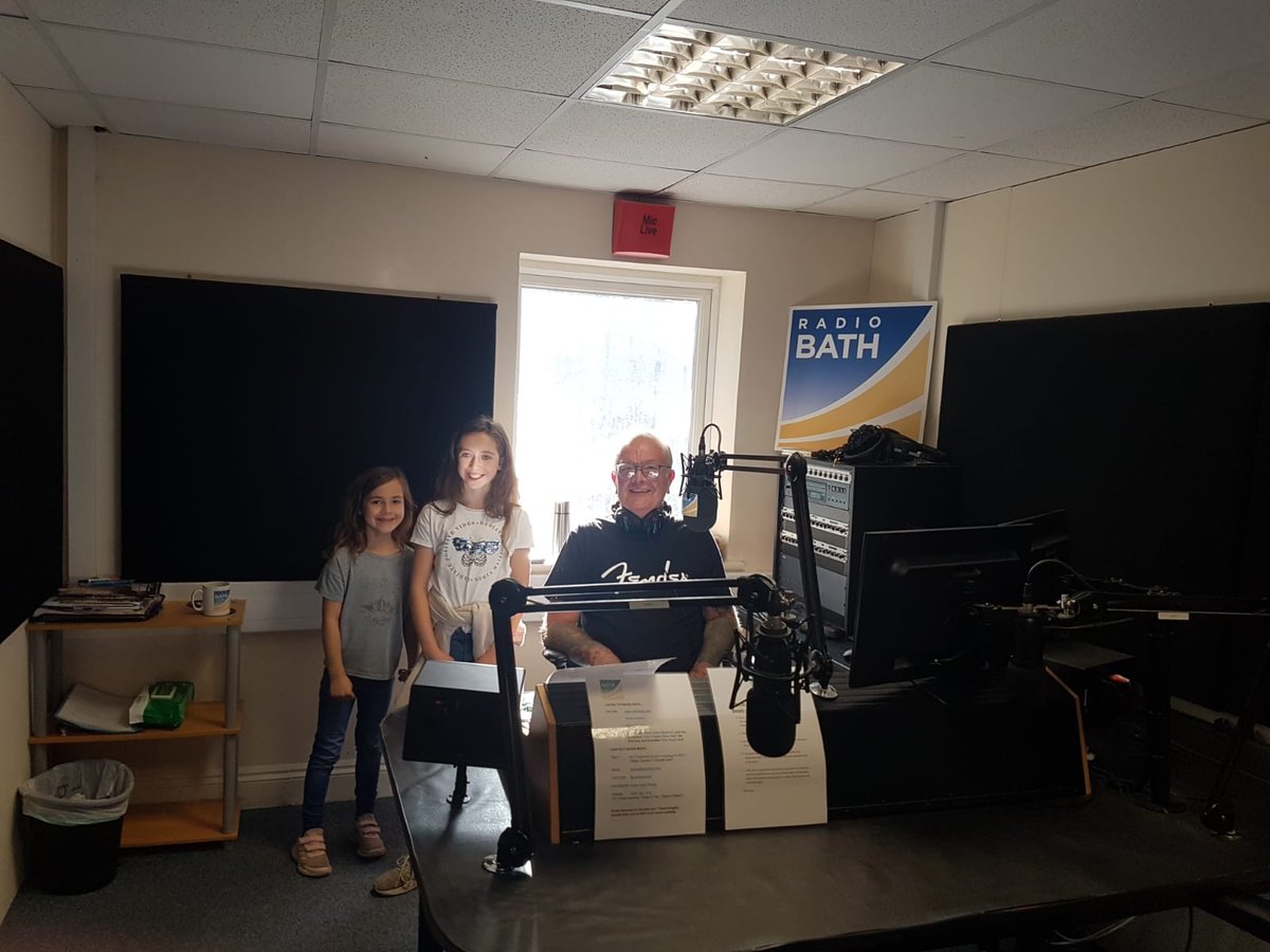 RadioBathDAB's tweet photo. Tim Angell had a chat with these supporters of @CHSW while their #CheerBus was parked up outside the studio supporting those running to raise funds for the charity in the #BathHalf You're always welcome here at Radio Bath. #Bath #CHSW https://t.co/fJrqci9Lr5