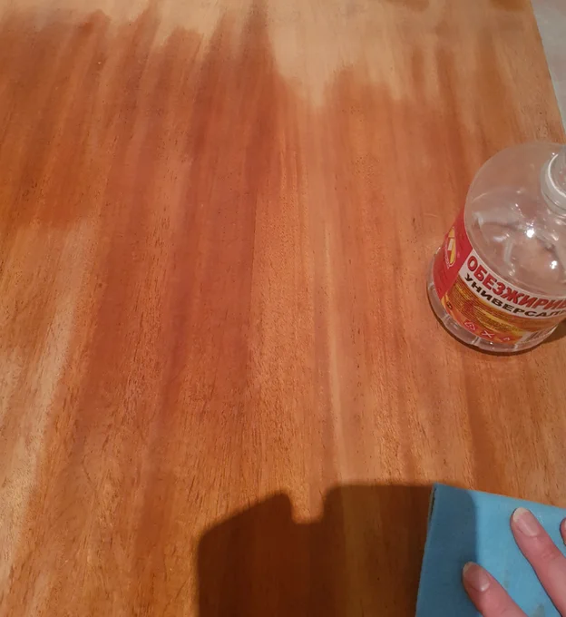 USSR  Apply wood veneer on your table2. Paint it so nobody knows there is veneer3. Dip in a tank of varnish three times4. ???5. ProfitWhen I finally scraped my way to that wood I felt like HERE'S JOHNNY!!! 