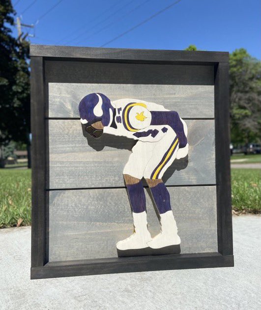 Climb_ThePocket's tweet photo. 🚨 ANNOUNCEMENT🚨

CTP is adding a new sponsor @thatsbadassmn !!

Luis makes incredible wood art, and we’re thrilled to have him as a sponsor!

If you’re looking for a #Vikings piece, or something custom you can use promo code “CTPocket” and get 20% off any one item! #SKOL https://t.co/2DQkwTbjw1
