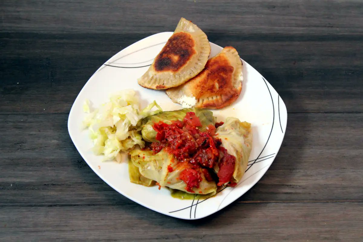 FreshCookedFun's tweet image. Who wants some perogies and cabbage rolls?   One perogy is farmer&apos;s cheese, the other is cabbage and bacon.   The cabbage rolls are stuffed with turkey.   It was a hearty cold weather meal!