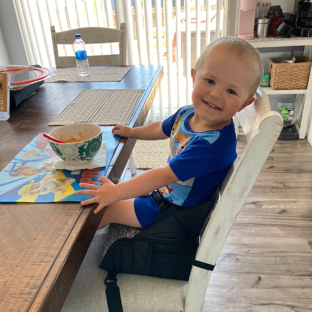 Big smiles for our Kolcraft Travel Duo 2-in-1 Portable Booster Seat and Diaper Bag 😄