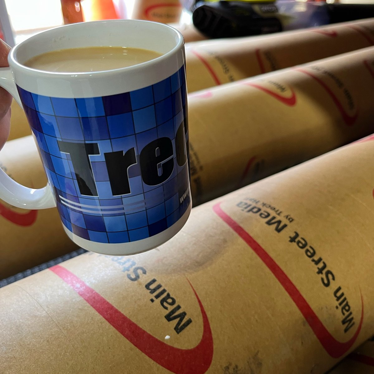 One of our fabulous clients starting the week off with a solid cup of coffee in his <a href="/TreckHall/">Treck Hall</a> mug, and several rolls of our equally irreplaceable Main Street wide format print media! Our customers are the best! 🍁💖 #HappyMonday