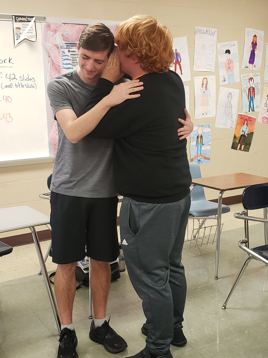 HonorsEnglish6's tweet photo. Connor and Carson take their game of telephone VERY seriously. https://t.co/1NpXwDFSu3