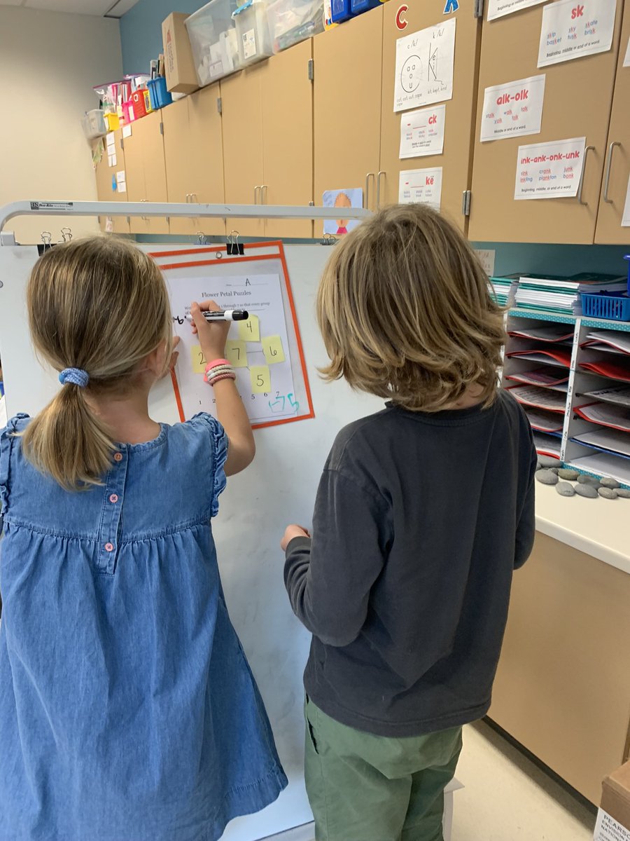 BoothbySuzanne's tweet photo. #buildingthinkingclassrooms with #PBJpartners,  flower petal #thinkingboards and target numbers of 10, 12, 14. There were no #hogsorlogs as they worked together to solve their problems and proud smiles say it all! Another one tomorrow! @APSMath @Ashlawneagles https://t.co/QshAvBYO6O
