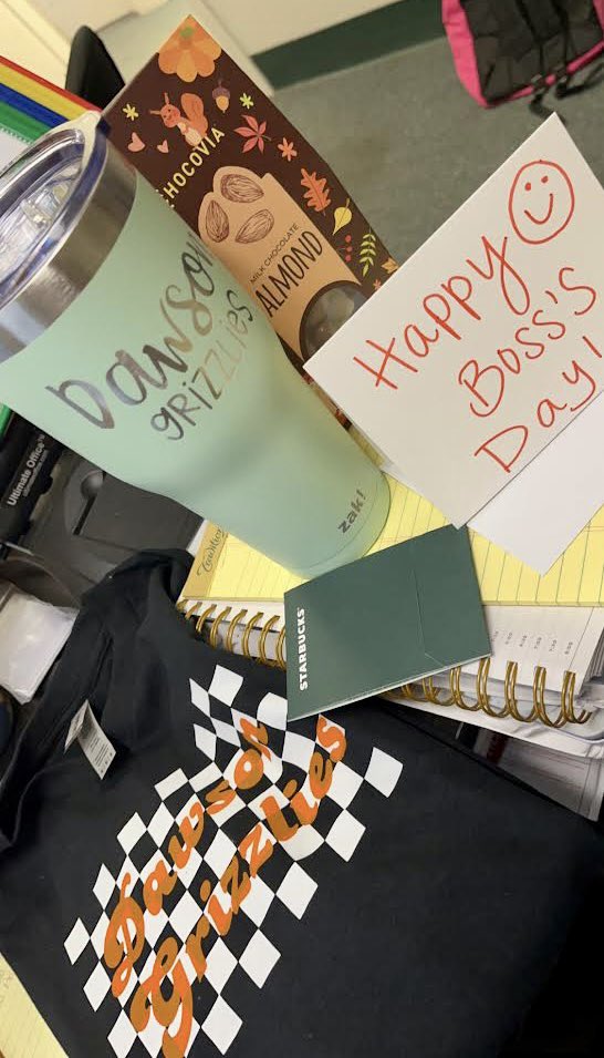 DawsonGrizzlies's tweet photo. Dawson school is appreciative to have Ms. Daulton as one of our leaders! 🧡🖤 https://t.co/cHd8jgmbLK