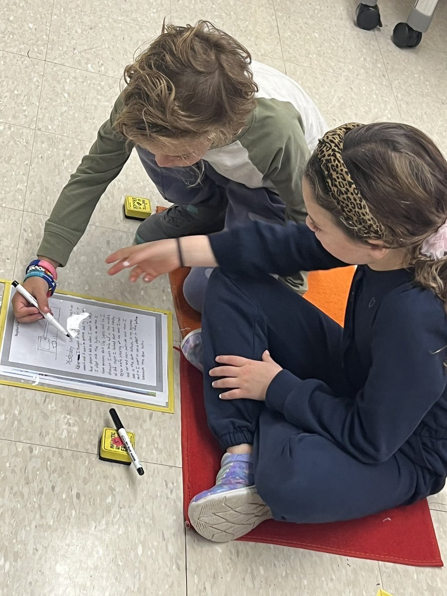 Phonics:partners working together to fix run-on sentences by adding in ending punctuation.