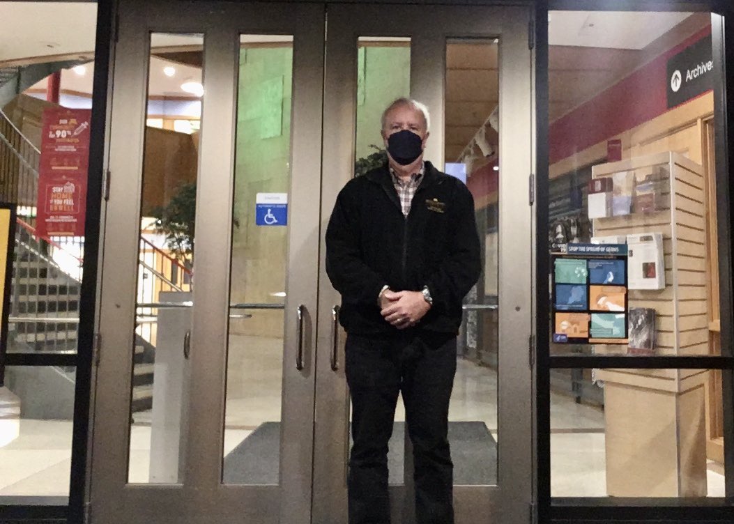 UMNBookworm's tweet photo. Not to be framed as a literal gatekeeper…just your friendly campus curator waiting to open locked doors & invite students in from the cold, to be warmed by viewing & discussing some medieval manuscript leaves @umnlib. Libraries…your refuge from a cold, dark world. https://t.co/BsRTW2AL2i