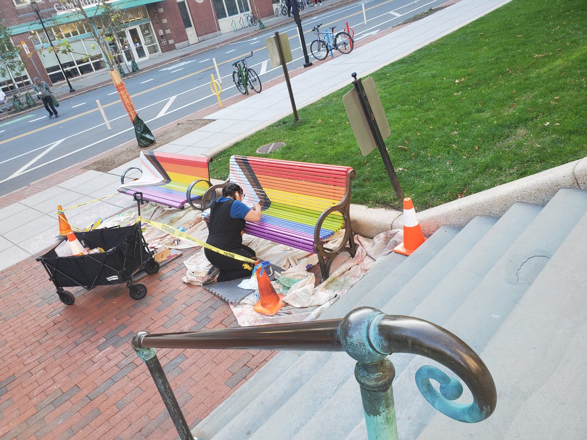 CambLGBTQPlus's tweet photo. @alexmakesart painting the Cambridge City Hall front benches like Progress Pride Flags!

Dontcha just love Cambridge? https://t.co/iS9i5fCzN8
