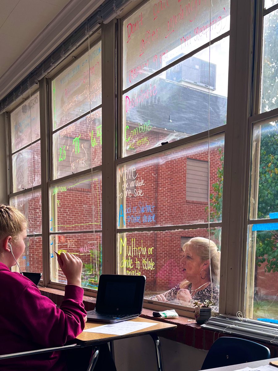 My superintendent stopped by today.(: So much joy on both sides of the math stained glass.
