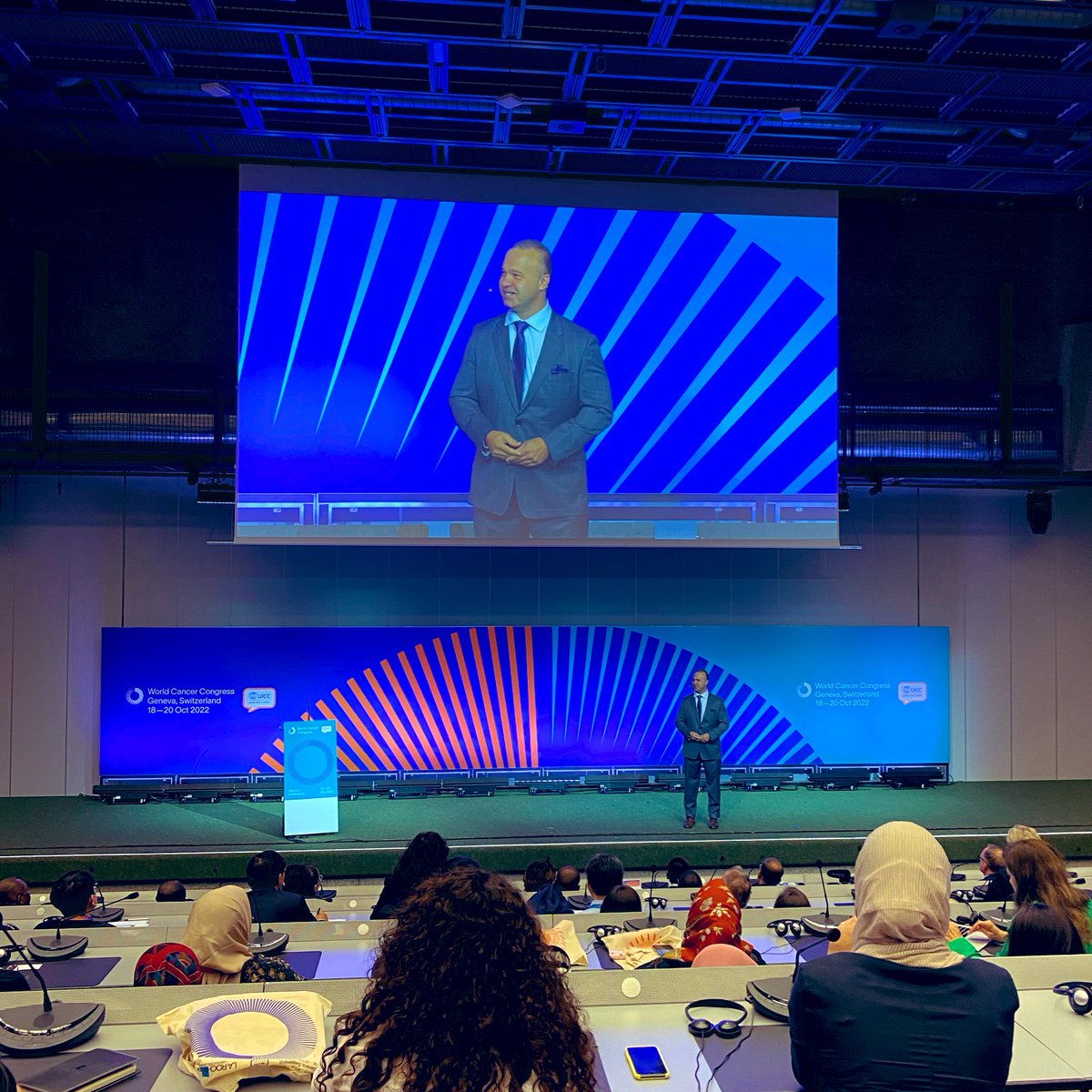 Powerful plenary from <a href="/DavewithGRYT/">David Craig</a> telling of his experience with cancer as patient, researcher and caregiver. His dad had a saying that fits with the work we are all doing in cancer control: ‘The difficult we do immediately, the impossible just takes a bit longer’ #WCC2022