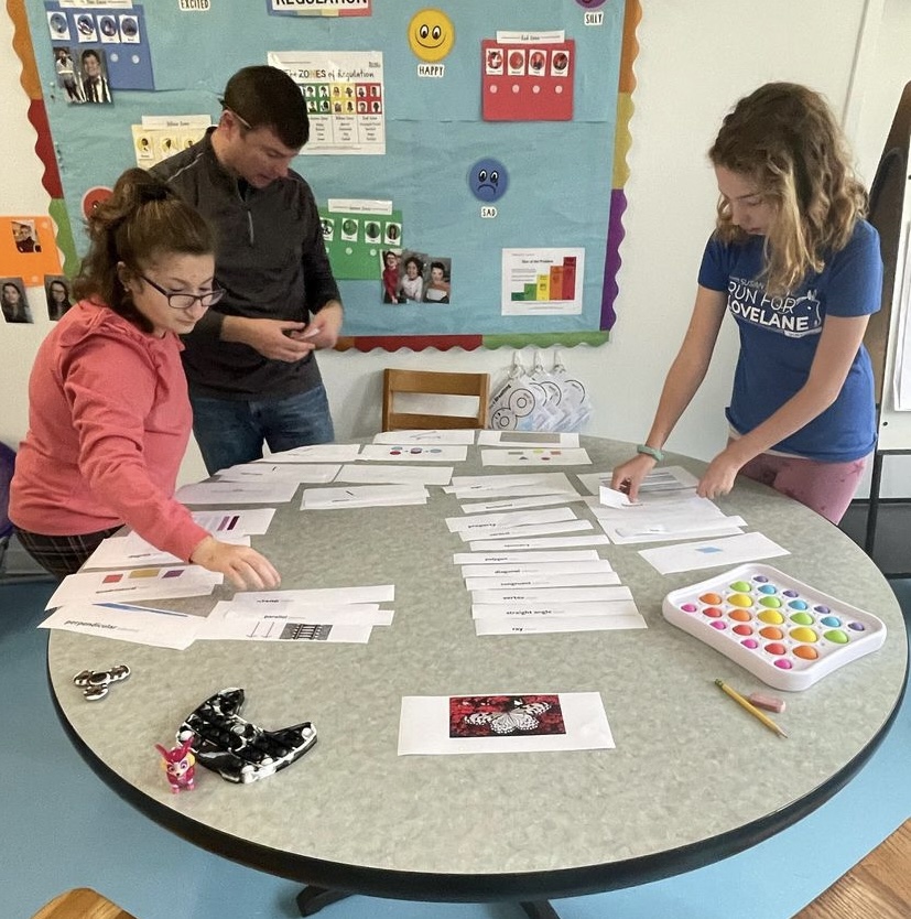 CottingSchool's tweet photo. During #math block, Ms. Cain’s Upper School students worked on sorting geometry vocabulary words such as acute angle and parallel. What a great hands-on assignment! 

#SpecialEducation #SpecialEdChat #Geometry #Education #EdChat #learning #MathChat https://t.co/8fhsglK6GI