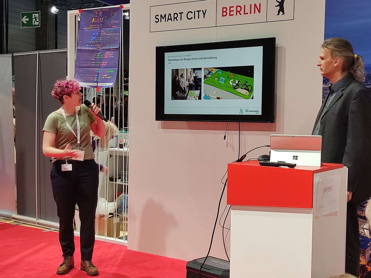 Fraunhofer FOKUS - Digital Public Services (@fokuspublic) on Twitter photo Eine App zur besseren Bürger:innenbeteiligung: Susanna Kuper und Ekkart Kleinod stellen auf dem <a href="/SmartCountryCon/">Smart Country Convention</a>-Stand von <a href="/BerlinPartner/">Berlin Partner</a> die #KiezRadar-App vor, die in Kürze in die zweite Runde gehen soll. Infos zum Projekt: fokus.fraunhofer.de/de/dps/Projekt… #SCCON22 Eine App zur besseren Bürger:innenbeteiligung: Susanna Kuper und Ekkart Kleinod stellen auf dem <a href="/SmartCountryCon/">Smart Country Convention</a>-Stand von <a href="/BerlinPartner/">Berlin Partner</a> die #KiezRadar-App vor, die in Kürze in die zweite Runde gehen soll. Infos zum Projekt: fokus.fraunhofer.de/de/dps/Projekt… #SCCON22