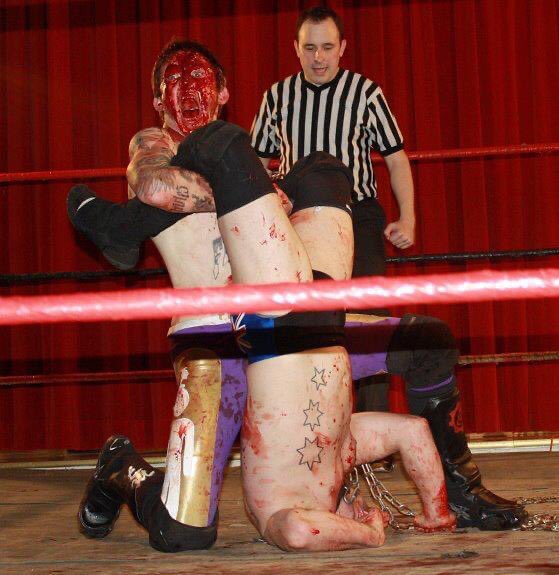 From @stlanarchy’s past it’s @MatFitchett trying to submit @Dingodriver in their dog collar match at Yuletide Terror