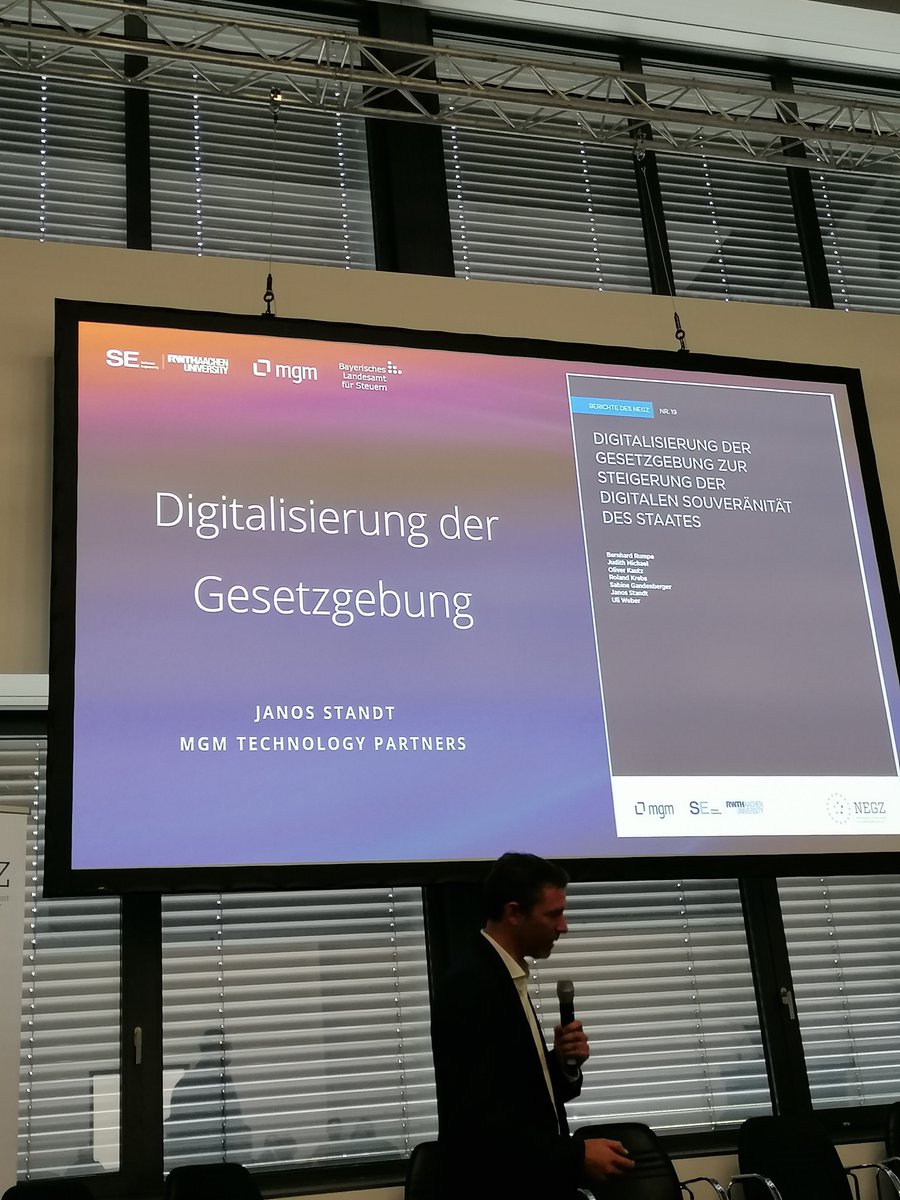 mgm_tp's tweet photo. #NEGZ-Session auf der #SCCON22. Kollege @janos_standt stellt nochmals die Studie vor, die den Einsatz von maschinell verarbeitbaren Sprachen bei der Gesetzgebung erforscht. Mehr dazu zum Nachlesen: https://t.co/mg5TCvZYF5

#CodeAsLaw #DigVw #eGov #DSL #LowCode https://t.co/5IqllDMHrd