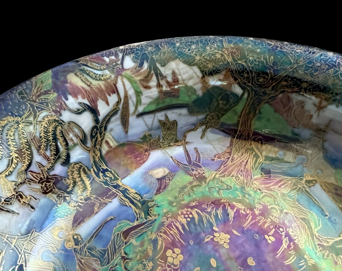 BADA1918's tweet photo. One of the highlight objects in this week’s newsletter 📩A stunning Wedgwood Fairyland Lustre lilly tray by Daisy Makeig Jones, circa 1920. From the stock of BADA Member Ad Antiques.

Click here to read more: https://t.co/gLSV7LniUO https://t.co/UDVn5HMojv