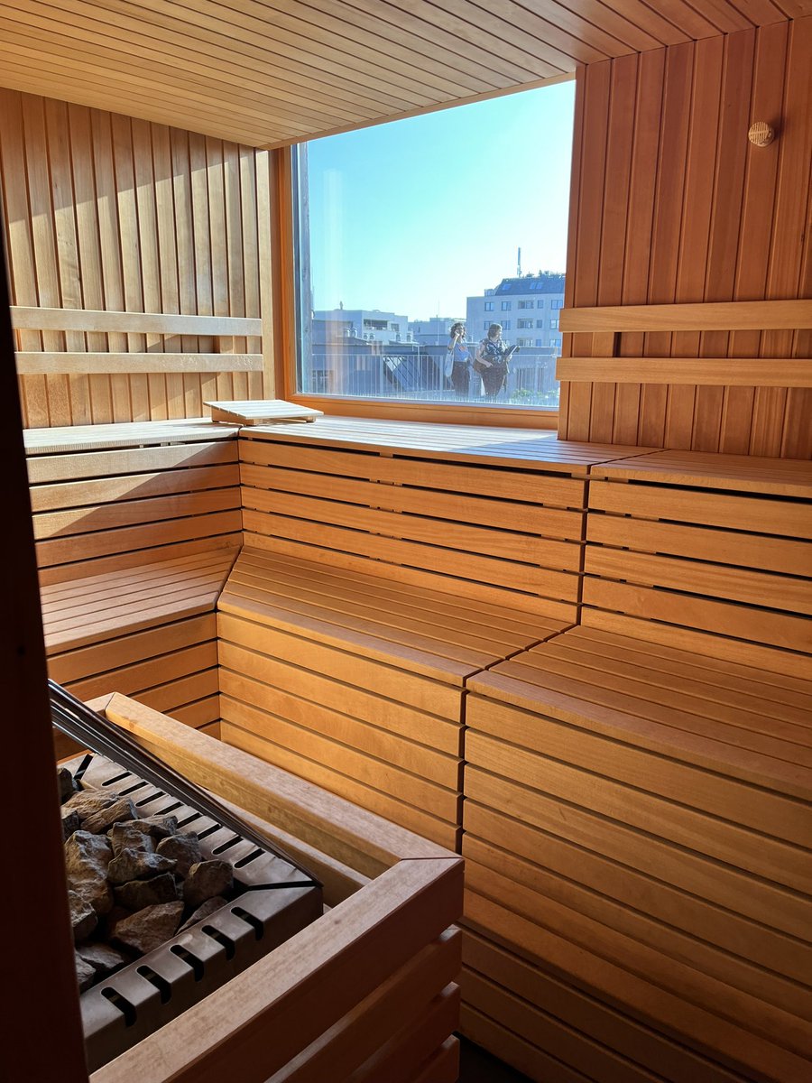 EmilyAssembly's tweet photo. Look at this. Huge playground next to elementary school. Kids can walk safely everywhere they need to go. In the bldg on the roof of co op has library, common room, play room, community garden and..: sauna!!!! #wheninwein https://t.co/z80UL15wRR