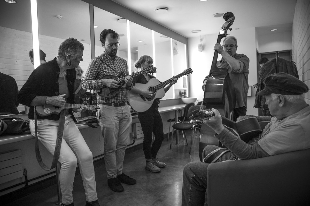 BU used to be the acronym for a great publication called BLUEGRASS ULIMITED, but on Saturday night last it referred to Andrea Booth's diminutive instrument, the BLUEGRASS UKULELE ! Here she is, rehearsing in the dressing room of the GB Shaw Theatre with NTB, before their gig !