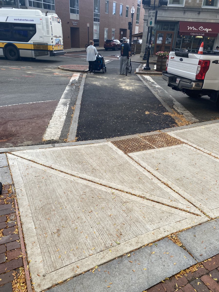 More progress photos of the new accessible ramps and crosswalks that have had the bricks removed in Davis Sq.